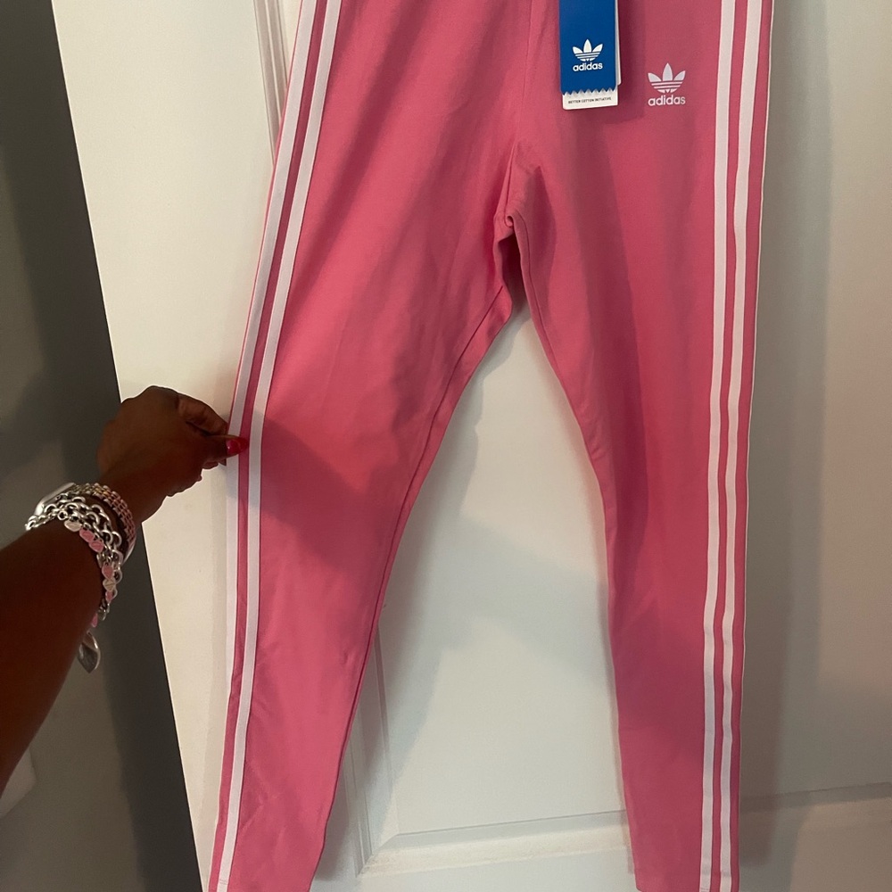 Adidas Women’s Athletic set. Includes Leggings with White 3-Stripes and tank.